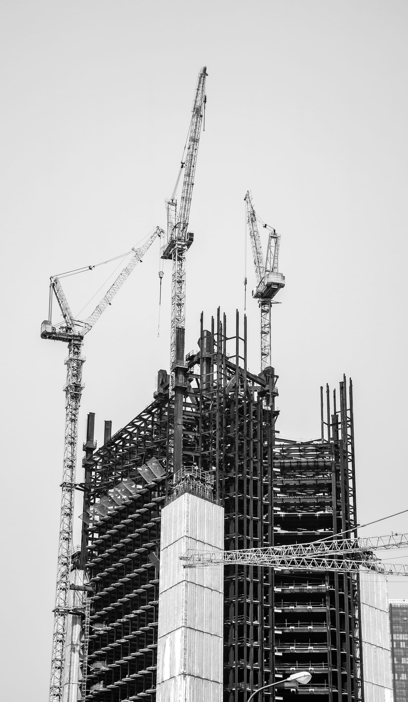 Large construction site showing contractor activity across multiple work zones